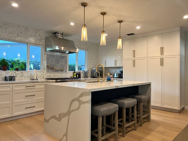 lighting to enhance openness in a cramped kitchen