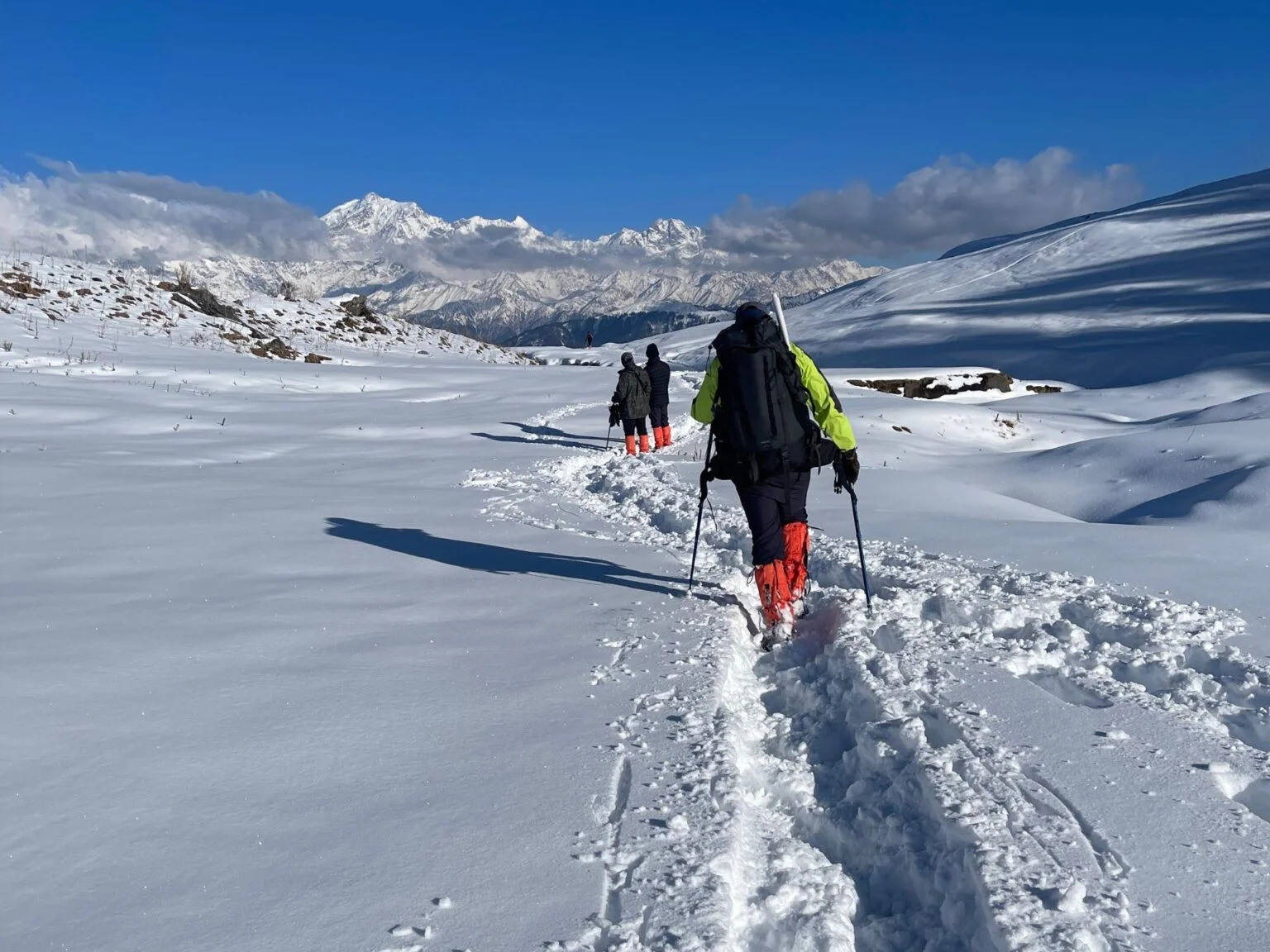 Snow-covered trails of Dayara Bugyal during winter trekking.