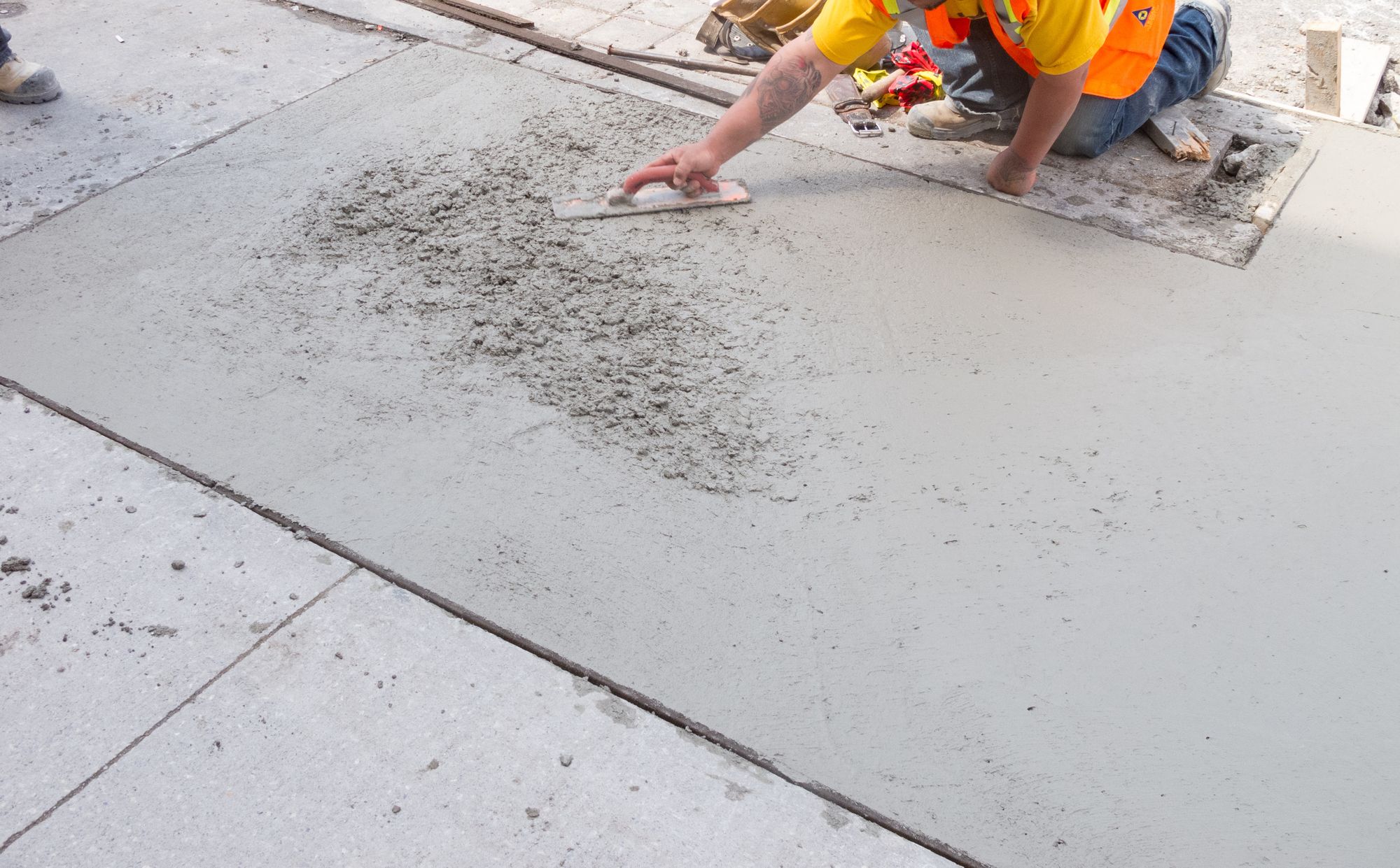 repairing concrete sidewalk